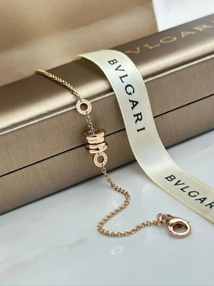 Bvlgari B.Zero1 Bracelet 350684 rose gold chain with spiral pendant and Bvlgari ribbon