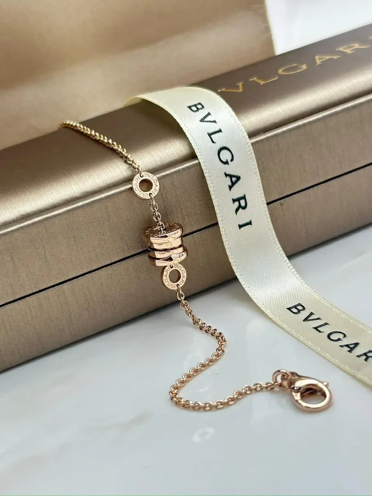 Bvlgari B.Zero1 Bracelet 350684 rose gold chain with spiral pendant and Bvlgari ribbon
