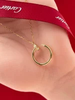 Cartier-Juste-Un-Clou-Pendant-B7224890-18k-Yellow-Gold-Diamonds-Hand