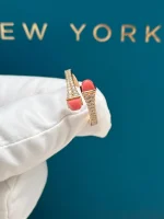 Marli-Cleo-Diamond-Slim-Ring-18k-Yellow-Gold-Pink-Coral-Hand