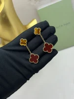 Van-Cleef-Arpels-Magic-Alhambra-Earrings-2-Motifs-18k-Yellow-Gold-Carnelian-Hand