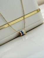 Boucheron-Quatre-Blue-Edition-Mini-Ring-Pendant-Yellow-Rose-White-Gold-Blue-Ceramic