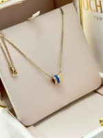 Boucheron-Quatre-Blue-Edition-Mini-Ring-Pendant-Yellow-Rose-White-Gold-Blue-Ceramic-Box