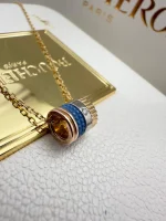 Boucheron-Quatre-Blue-Edition-Mini-Ring-Pendant-Yellow-Rose-White-Gold-Blue-Ceramic-Side