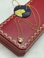 Panthere-De-Cartier-Pendant-CRB7224757-18k-Yellow-Gold-Onyx-Tsavorite-Garnets-Rare-Model-Up