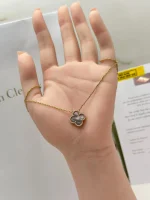 Van-Cleef-And-Arpels-Vintage-Alhambra-Rose-Gold-Pendant-VCARP4KK00-Hand
