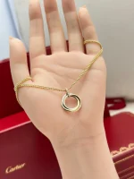 Cartier-Trinity-Medium-Model-Pendant-B7224814-18k-Yellow-Rose-White-Gold-Diamonds-Hand