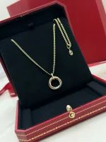 Pre-owned Cartier Pendant in UAE - Trinity medium model displayed in the Cartier box