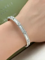 Van-Cleef-Arpels-Perlee-Sweet-Clovers-Bracelet-VCARP6X900-Small-Model-White-Gold-Hand