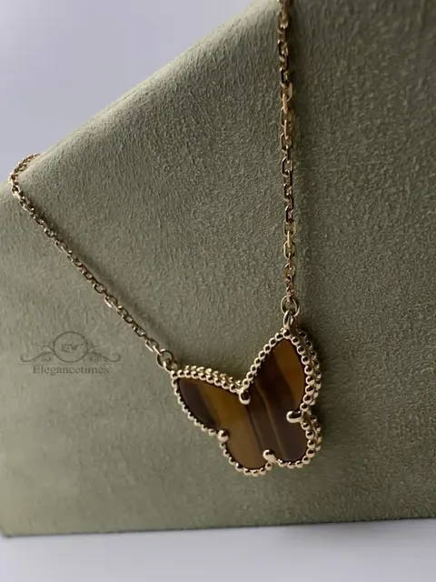 Van Cleef & Arpels Alhambra Lucky Alhambra butterfly pendant in tiger eye, ref VCARD98500