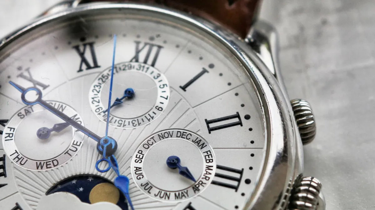 Cartier Tank watch close-up: a classic dial with Roman numerals and sub-dials