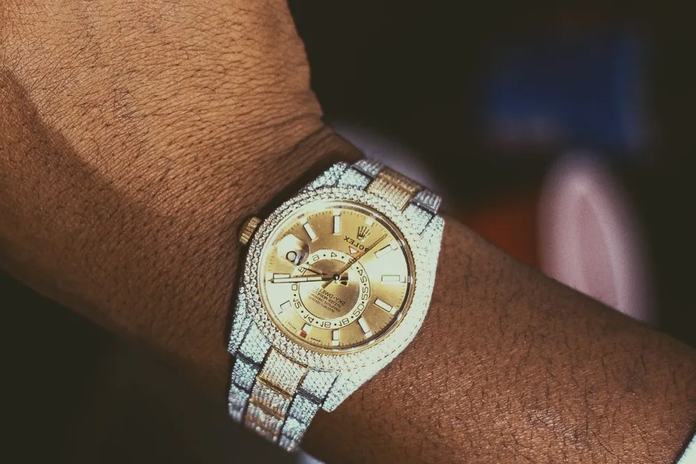 Rolex Pearlmaster 34 vs 39: a diamond-set gold watch on the wrist
