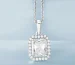 Messika Move Uno necklace in Dubai, pavé diamond pendant on a light blue background